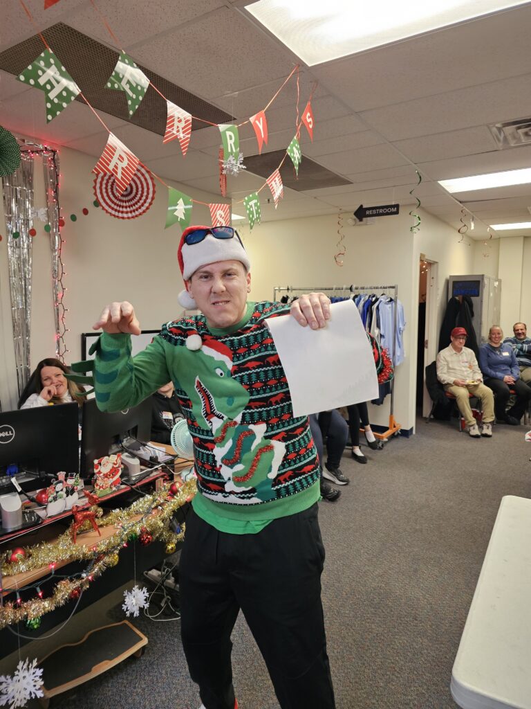 He won the Ugly Sweater contest